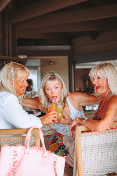 Guests with drinks at the table