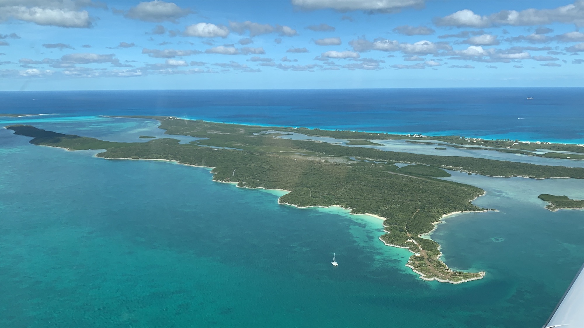 Cistern Cay from the air, Great Harbour Cay beyond
