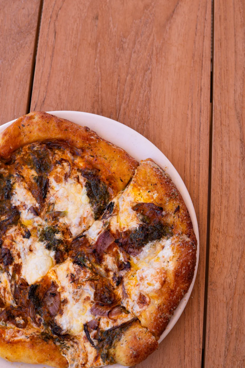 Wood-fired pizza on the table